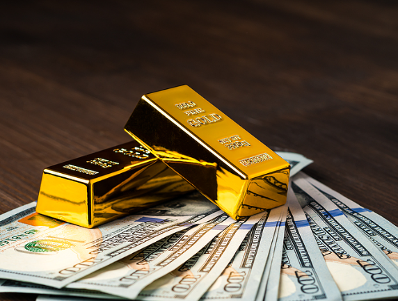 Gold IRA tax rules - gold bars and money